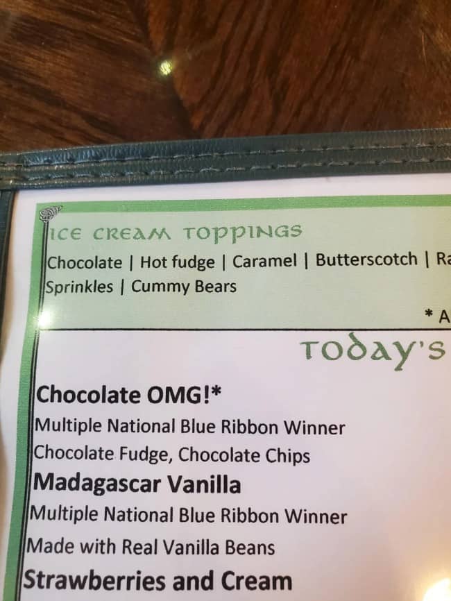 Hilarious menu typos spelling cummy bears instead of gummy bears for ice cream toppings.