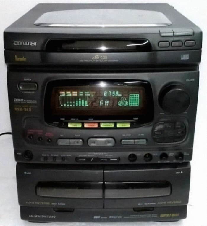 Classic 90s Aiwa shelf stereo system with dual cassette decks, CD player, and glowing graphic equalizer display featured in nostalgic images.