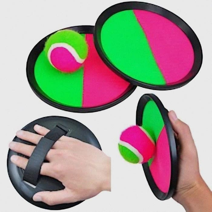 Neon pink and green velcro toss-and-catch paddle game set with a fuzzy neon ball featured in nostalgic images.