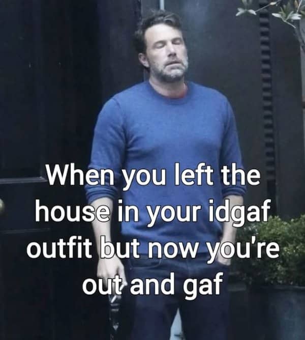 Ben Affleck walking in a sweater with text about an idgaf outfit turning into regret