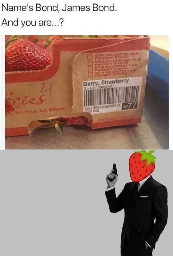 Strawberry carton labeled Berry, Strawberry beside a suited figure with a strawberry head