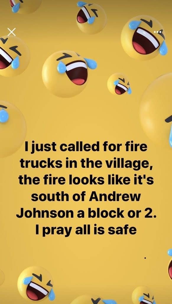 Post about calling fire trucks for a village fire, set on a laughing emoji background