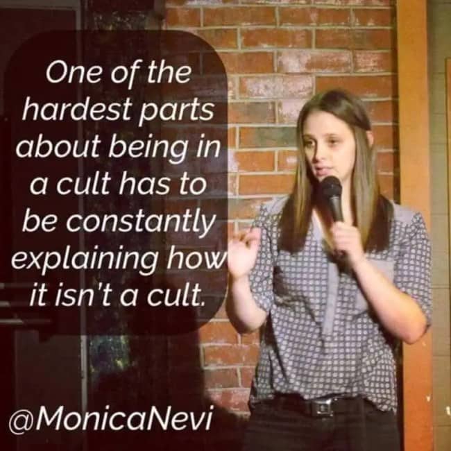 Female stand-up comic delivering line about cult social struggles in quick stand up jokes.