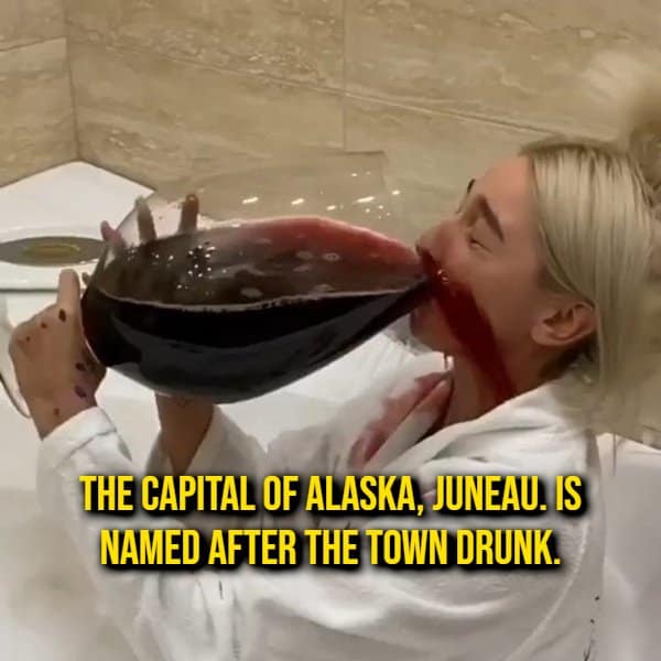 Woman in a bathtub drinking from a gigantic wine glass next to a state history random fact about the naming of Juneau, Alaska.