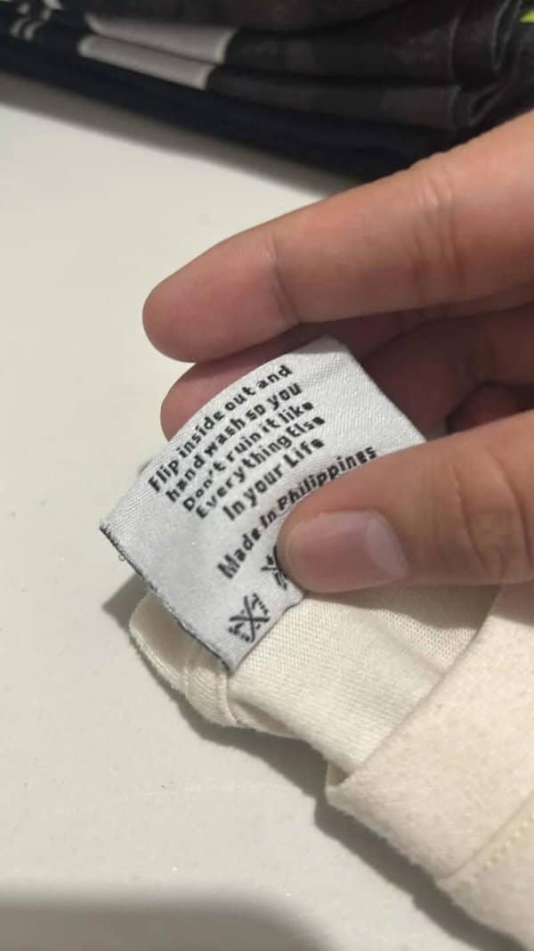 Clothing tag telling the owner to hand wash so they don't ruin it too.