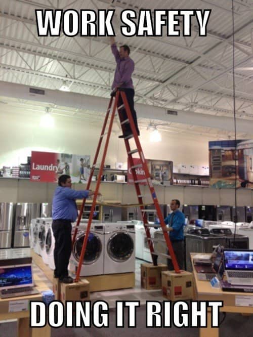 Meme showing store employees on a ladder propped on cardboard boxes labeled work safety