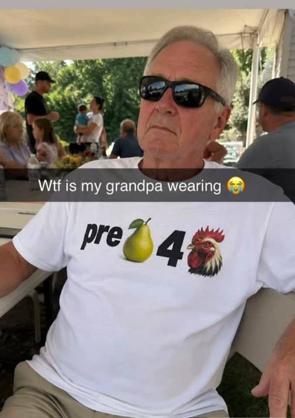 Grandpa wearing a raunchy rebus puzzle graphic shirt sitting outdoors in funny seniors memes.