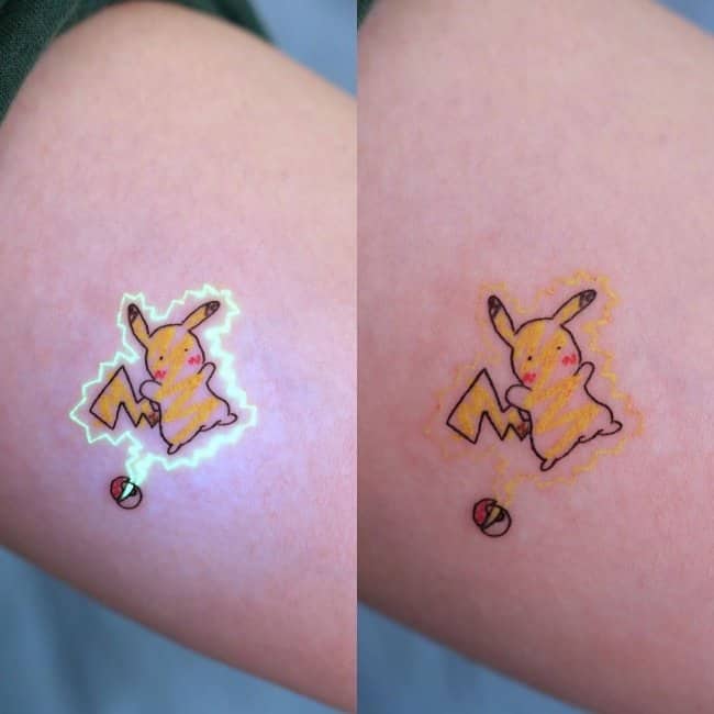 A glowing UV ink Pikachu unique tattoo showing bright neon yellow lighting effects in dark.