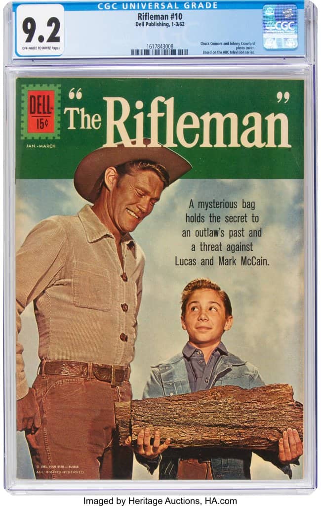 Dell photo cover for The Rifleman shows a man and boy holding a log outdoors.